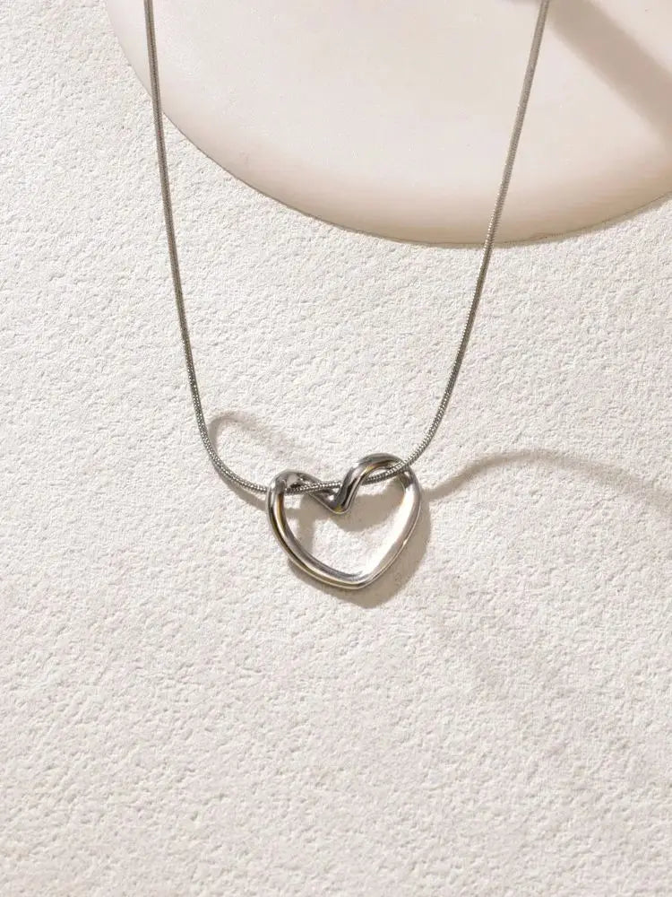 titanium steel hollow heart necklace